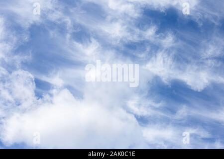 Blurred white clouds on the sky background. Stock Photo