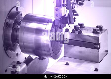Parts production process in the metal industry. Machining and finishing for smooth surface by CNC machine Stock Photo