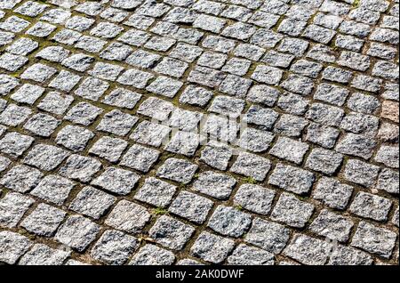 Abstract background of cobblestones making from rough stone blocks Stock Photo
