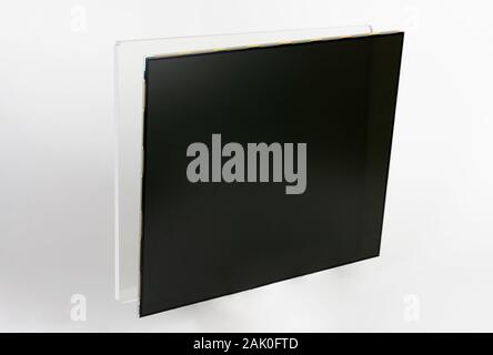 Two part of LCD monitor, firtst  part is 6 mm thick organic glass and  the second part is panel consists of polarizing filters, glass and  liquid-crys Stock Photo