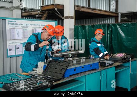 Technicians working in factory Stock Photo