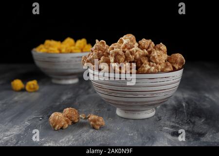A close up of caramel popcorn in a bowl taken in the studio. Stock Photo