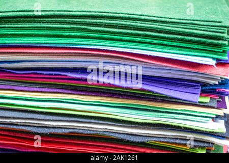 Close-up of square-shaped felts with many colors. Pulled over. Stock Photo