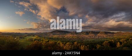 Autumn landscape at sunset - mountains and beautiful clouds, hills of Bohemian Switzerland and Saxon Switzerland National Park, Czechia and Germany Stock Photo