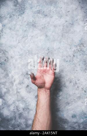 Man hand covered with paint Stock Photo