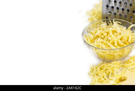 Grated Cheese isolated on white background (close-up shot; selective focus) Stock Photo