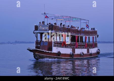 Cambodian tourism, a river boat cruise at the confluence of The Mekong River & The Tonle Sap River. Phnom Penh, Cambodia, Indochina. © Kraig Lieb Stock Photo