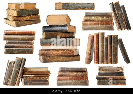 Isolated old books. Collection of old books in piles and stacks isolated on white background with clipping path Stock Photo