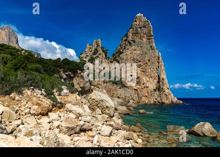 Pedra Longa in Baunei - beautiful rocky beach in Sardinia. Beautiful weather and beautiful beach in Ogliastra, Sardiniam Italy Stock Photo