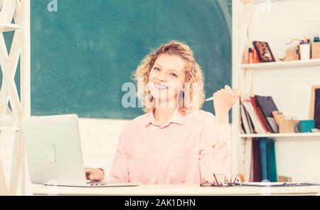 IT Lesson with Computer. e-learning concept. modern technology. girl Study Online in Classroom. happy student with laptop. online education. freelancer work. teacher woman. using tablet computer Stock Photo
