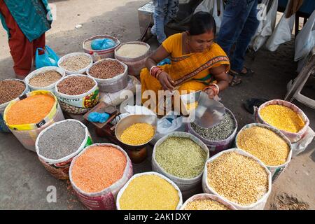 A vendor in the spice market in Chandni Chowk the old city of Delhi Stock Photo