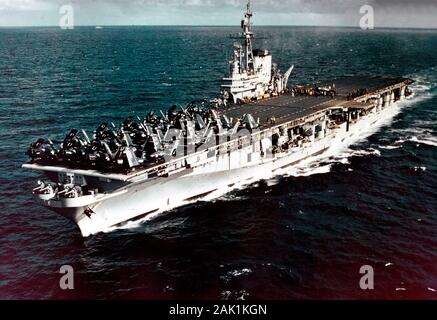 The U.S. Navy aircraft carrier USS Midway (CVB-41) steaming off the Firth of Clyde, Scotland (UK), prior to 'Operation Mainbrace' exercises, September 1952. Douglas AD-4 Skyraider, Vought F4U-4 Corsair, and Grumman F9F-2 Panther aircraft from Carrier Air Group 6 (CVG-6) are spotted on her flight deck. September 1952 Stock Photo