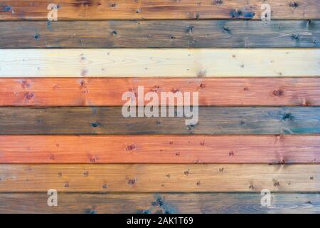 Background of multi-colored painted wooden boards, painted wood texture Stock Photo