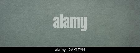 background and texture of gray handmade Indian paper created from recycled cotton fabric, panoramic banner Stock Photo