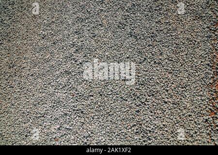 Detail of rough gravel background in a road near Bento Goncalves. A wine producing country city in southern Brazil. Stock Photo