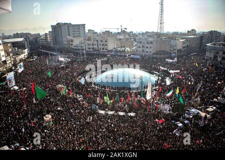 Tehran, Iran. 6th Jan, 2020. People attend the funeral ceremony of Iranian general Qassem Soleimani in Tehran, Iran, Jan. 6, 2020. Hundreds of thousands of Iranians in Tehran on Monday mourned the assassination of Qassem Soleimani. Credit: Ahmad Halabisaz/Xinhua/Alamy Live News Stock Photo