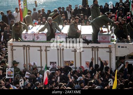 Tehran, Iran. 6th Jan, 2020. People attend the funeral ceremony of Iranian general Qassem Soleimani in Tehran, Iran, Jan. 6, 2020. Hundreds of thousands of Iranians in Tehran on Monday mourned the assassination of Qassem Soleimani. Credit: Ahmad Halabisaz/Xinhua/Alamy Live News Stock Photo