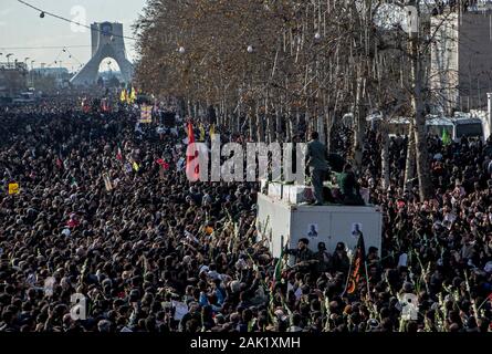 Tehran, Iran. 6th Jan, 2020. People attend the funeral ceremony of Iranian general Qassem Soleimani in Tehran, Iran, Jan. 6, 2020. Hundreds of thousands of Iranians in Tehran on Monday mourned the assassination of Qassem Soleimani. Credit: Ahmad Halabisaz/Xinhua/Alamy Live News Stock Photo