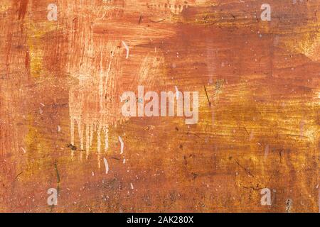 Old grunge rusty steel plate painted red,yellow,white color of background and texture. Stock Photo