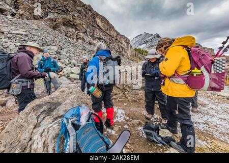 Hikers along Lake McArthur Trail in September in Yoho National Park, British Columbia, Canada [No model releases; available for editorial licensing on Stock Photo