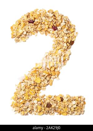 Arabic numeral '2'   from muesli with coconut, berries, raisins, cereal and natural cereals  on a white isolated background. Food pattern made from gr Stock Photo