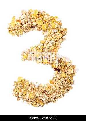 Arabic numeral '3'   from muesli with coconut, berries, raisins, cereal and natural cereals  on a white isolated background. Food pattern made from gr Stock Photo