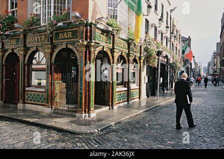 A colorful wooden facade decorates the pub The Quay's Bar that is situated at a corner in the district of Temple Bar in the Irish capital of Dublin. ( Stock Photo