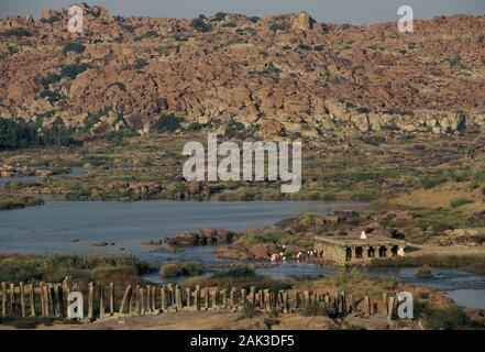 View of the ruins of Vijayanagar near Hampi in the federal state of Karnataka in Southern India. About 800 years ago Hampi was the capital of the Hind Stock Photo