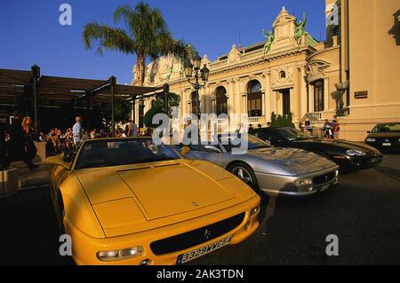 Luxury cars parking in front of the Cafe de Paris at the Plata de