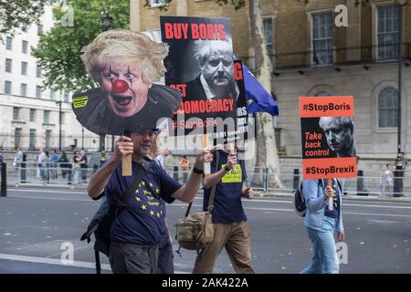 Remain protesters hold signs during an anti-Brexit protest along Whitehall street, London, UK. 09/09/19 Stock Photo