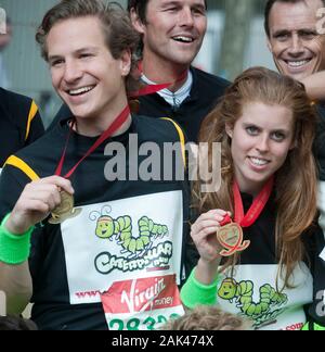 Princess Beatrice and boyfriend Dave Clarke celebrate after completing the London Marathon in 2010. Stock Photo