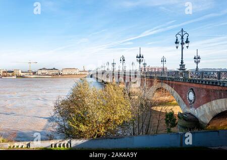 Bordeaux, France. View from the stone bridge over the Garonne river, in the city declared a World Heritage Site by UNESCO, famous for its fine wines. Stock Photo