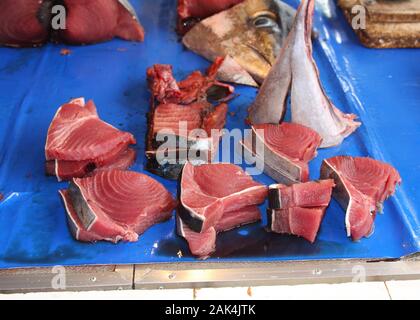 Fresh yellowfin tuna steaks for sale in Tabaco City fish market, The Philippines Stock Photo