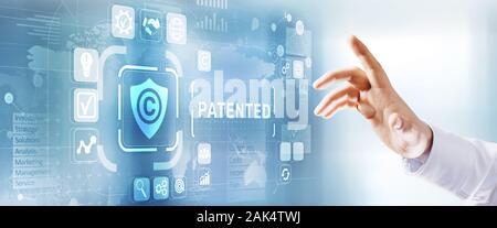 Patented intellectual property right management concept patent button on virtual screen Stock Photo