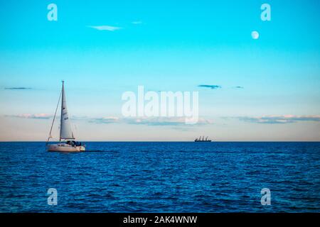 Sailing yacht out on the ocean Stock Photo