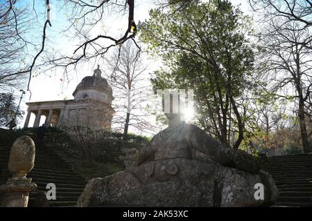 (200107) -- BOMARZO, Jan. 7, 2020 (Xinhua) -- Photo taken on Jan. 3, 2020 shows the sculptures in the Park of Monsters in Bomarzo, Italy. Bomarzo, a village in Lazio at the foot of Mount Cimino, possesses a unique work, the Villa of Marvels, also called the Sacred Wood or Park of Monsters. lt was designed by Duke of Bomarzo, Vicino Orsini and architect Pirro Ligorio in 1552.This ltalian style garden follows geometric and perspective rationality with embellishments such as wide terraces, fountains with water games and mannerist sculptures. (Xinhua/Cheng Tingting) Stock Photo