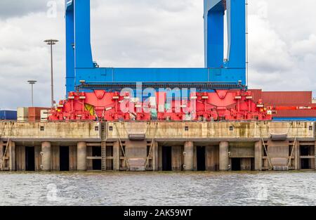 quay crane closeup seen at the Port of Hamburg in Germany Stock Photo