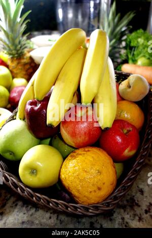 Various Fresh Fruit on Display in a Wicker Basket at the Azul Beach Resort Hotel, Puerto Morelos, Riviera Maya, Cancun, Mexico. Stock Photo