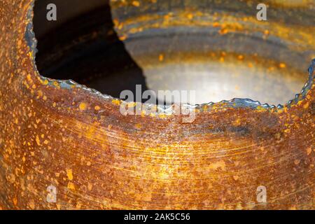 full frame abstract sunny illuminated rusty metalllic background Stock Photo