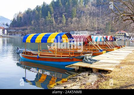 Traditional wooden boats on Lake Bled in Slovenia Stock Photo