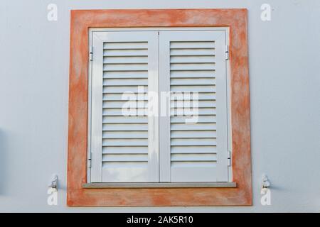 Closed window shutters Stock Photo