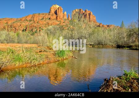 A view of Sedona's Cathedral Rock from Oak Creek inside the Crescent Moon Recreational Area. Stock Photo