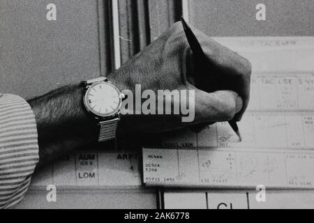 Fine seventies black and white extreme photography of a hand using a pen and penmanship Stock Photo