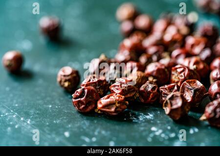 Raw Organic Dried Juniper Berries / Dry Root Berry Seeds. Organic Food. Stock Photo