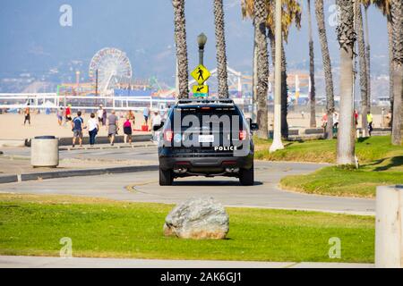 Santa Monica police department Ford patrol car on the beach road, Santa Monica, Los Angeles, California, United States of America Stock Photo