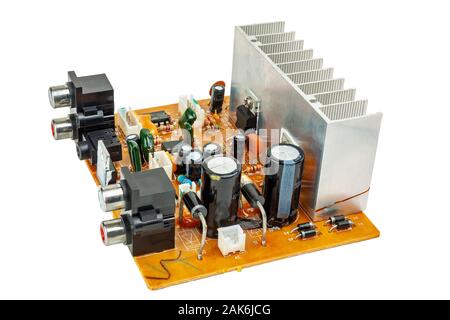 Electronic circuit board of audio amplifier close-up on a white background. Stock Photo
