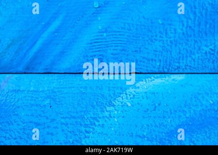 The wooden texture is blue with rich shades. Close up. Stock Photo