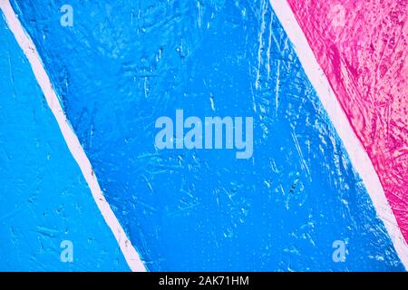 Texture blue, pink sawdust with white lines. Close up. Stock Photo