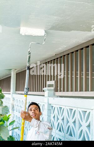 Miami Beach Florida,Presidential Condominiums,Hispanic man men male,painter,roller,FL100620001 Stock Photo