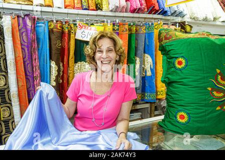 Miami Florida,display case sale,textile,material,cloth,fabric,shopping shopper shoppers shop shops market markets marketplace buying selling,retail st Stock Photo